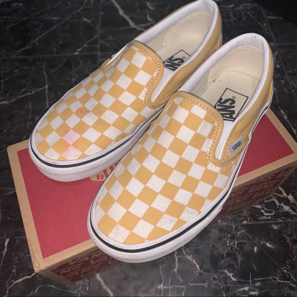 Yellow checkerboard slip on vans